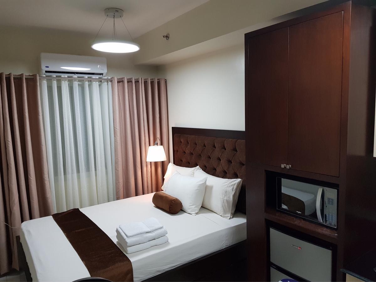 Studio Unit At The Breeze Residences Manila Exteriör bild
